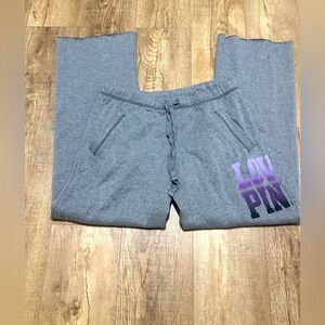 PINK Victoria’s Secret Women's Sweatpants in Grey w/ Purple letters. Size Medium